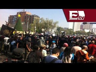 20 encapuchados identificados y una mujer detenida en la marcha de 1 de diciembre