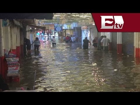 Se desborda canal de aguas negras en Neza y Chimalhuacán/ Andrea Newman