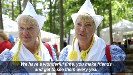 Multiple twins rally in US town of Twinsburg for twice the fun