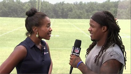 Devonta Freeman interviews Tiffany Blackmon at training camp