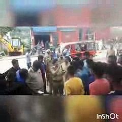 A Police Officer Counsels People on Safe Driving