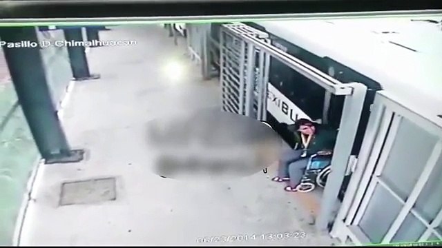 Mexican woman in wheelchair and walks away from moving bus