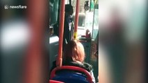 Furious man berates UK bus driver