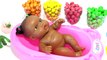 Learn Colors Finger Family Song Nursery Rhymes Color Baby Doll Bath Time with M&M chocolate Video