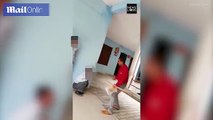 Indian headmaster beats children till he breaks a cane