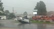 Severe Thunderstorm Flips Over Cars In Front of Strip Mall
