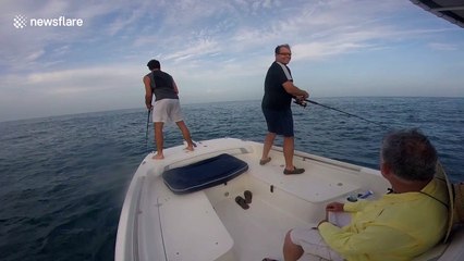 Fisherman topples over and falls off boat into the sea