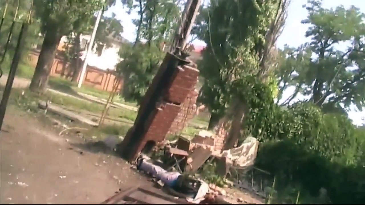 Убитые и раненые наемники после обстрела ВСУ базы бригады "Заря" в оккупированном Луганске 11 июля 2014-го.