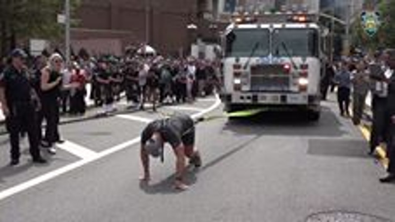 Aussie Police Commander Pulls 2 NYPD Trucks to Raise Awareness for Mental Health