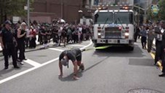 Aussie Police Commander Pulls 2 NYPD Trucks to Raise Awareness for Mental Health