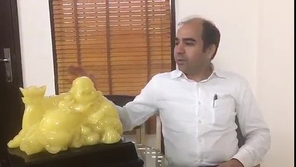 Where should you place a Laughing Buddha at home according vaastu