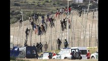 Thousands of Muslim Migrants Storm Border with SPEARS Stones Sticks