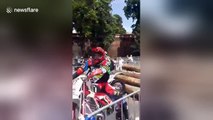 Motorcyclist loses control at race and hits spectator