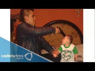 Hombre sube foto a Facebook apuntando a un bebé con arma de fuego