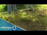 Identifican en Iguala a familia enterrada en fosa clandestina