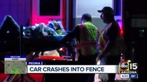 Car crashes into fence in Peoria