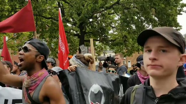 Counter-Protesters Chant 'Love Has Already Won' at Charlottesville Rally