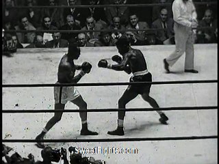 Ezzard Charles fights Jersey Joe Walcott
