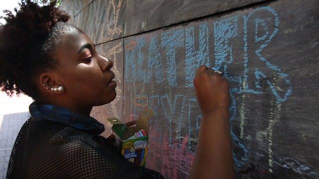 Charlottesville residents reach for hope, push away hate