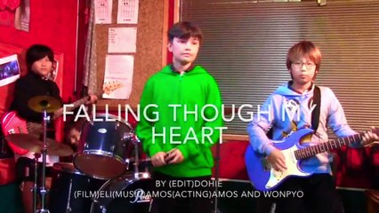 Dohie plays the guitar