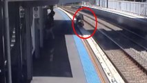 Mum desperately rescues baby as pram rolls on to train tracks