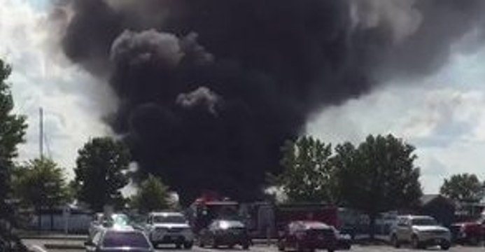 Black Smoke and Flames Rise From Boat Fire at Cedar Point