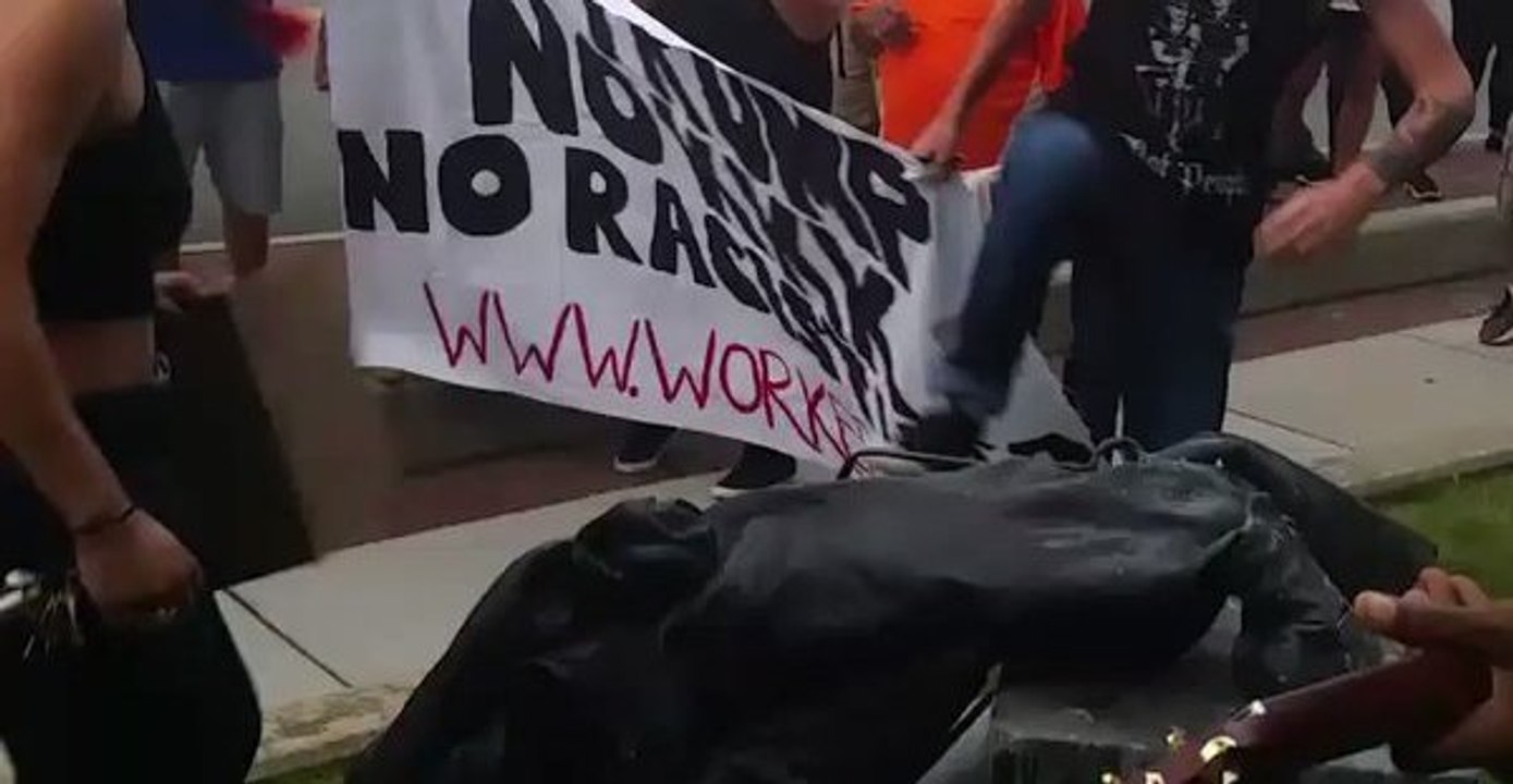 Durham Demonstrators Kick Toppled Confederate Monument