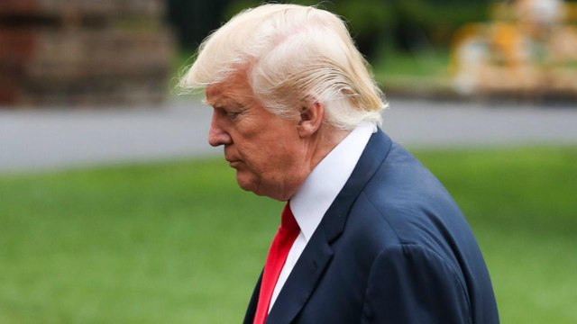 Donald Trump Retweets Cartoon of Train Hitting CNN Reporter | THR News