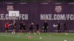 Busquets cheekily nutmegs Andre Gomes in training