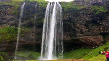 A waterfall is a place where water flows over a vertical drop or a series of drops in the course of a stream or river