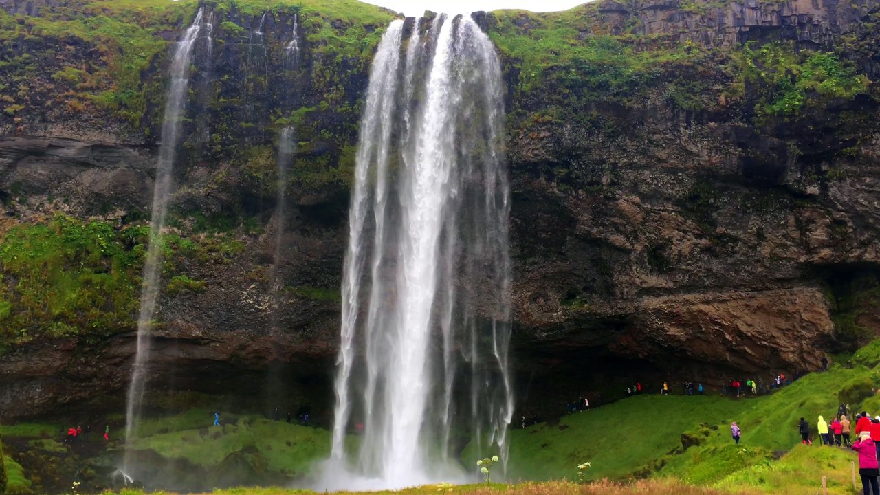 A waterfall is a place where water flows over a vertical drop or a series of drops in the course of a stream or river
