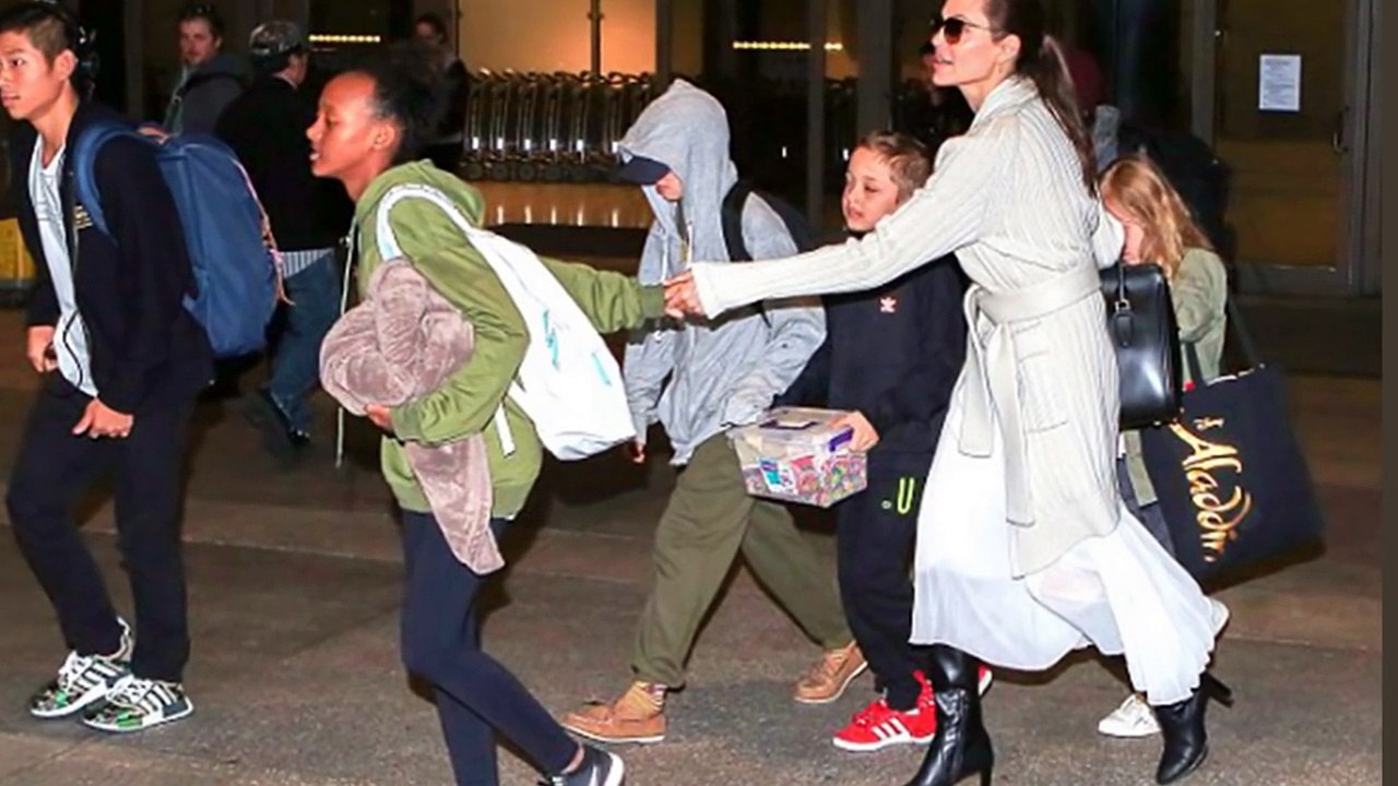 Angelina Jolie and her Six Children Arrive Back in Los Angeles