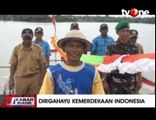 Nelayan Papua Gelar Upacara HUT RI di Atas Kapal