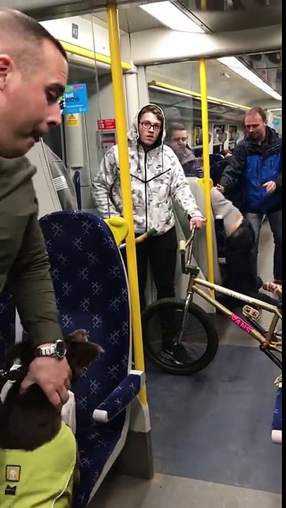 A train fight on 334011 at Anniesland after an Old Firm Rangers Celtic football match in G