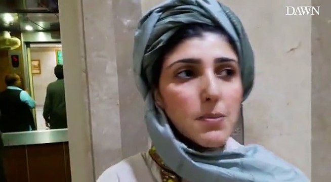 Ayesha Gulalai entering in the Parliament wearing a turban