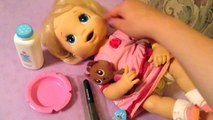 Vivo y bebé abucheo muñeca alimentación orinal formación 2006
