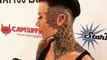 Heavily tattooed girl with stunning head, face and throat tattoos