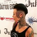 Heavily tattooed girl with stunning head, face and throat tattoos