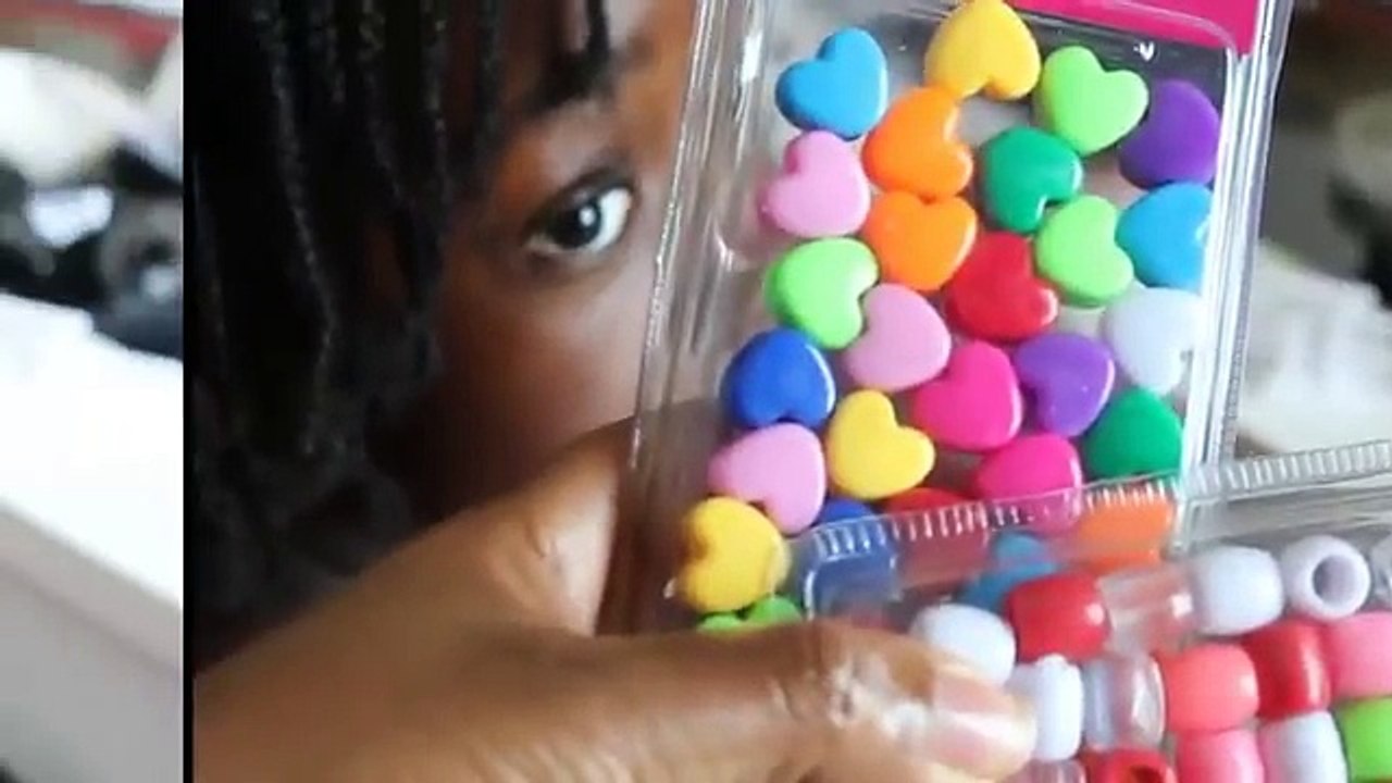 Chevelure coiffure enfant collées avec des perles cheveux afro
