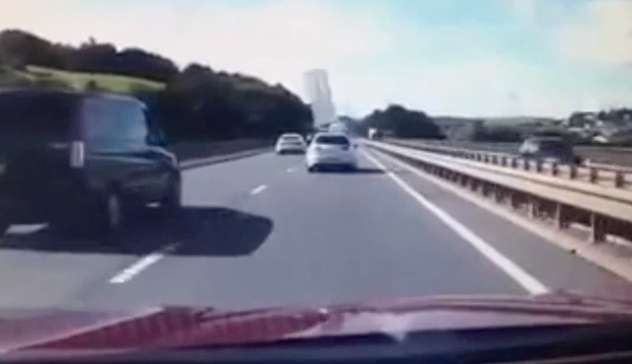 WATCH Door Flies Off Car In To Path Of Motorists On Busy Carriageway