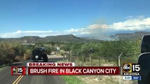 Crews battling brush fire near Black Canyon City