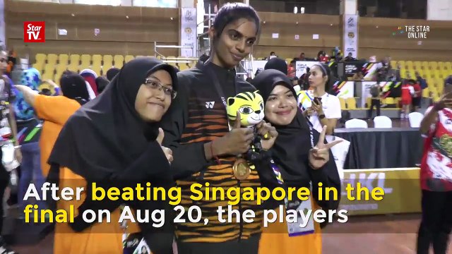 Malaysian netball team fulfils selfie requests from fans after final