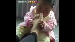 Funny Reaction Baby if eat thumb foot .