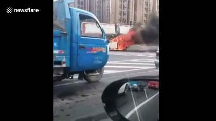 Moving car engulfed by fire