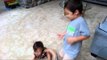 Big Brother Helps Adorable Sister Learn How to Walk