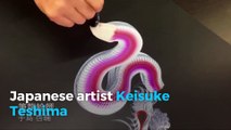 Japanese artist paints detailed dragon with single stroke