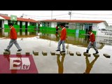 Estudiantes de Ecatepec toman clase en escuela inundada/ Comunidad