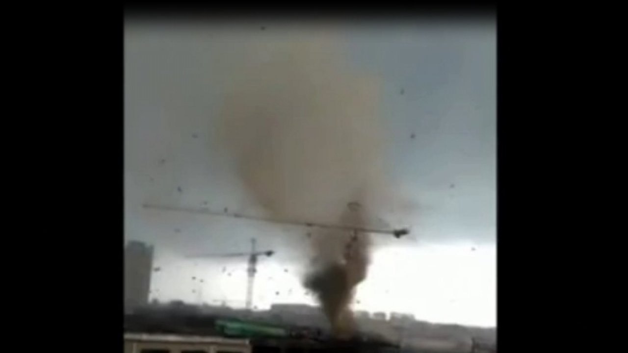 Footage shows tornado swirling above town in northern China