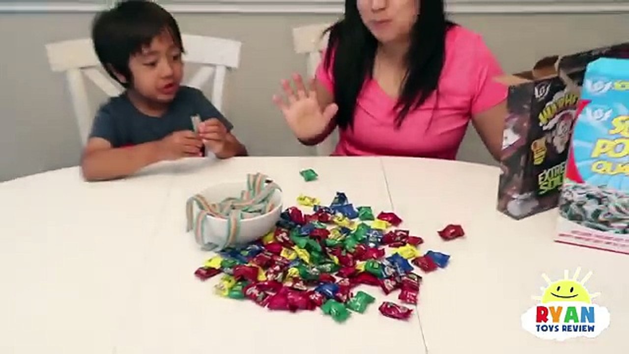 EXTREME SOUR CANDY CHALLENGE Warheads Cry Baby and Giant IceCream Surprise Candy Taste Test Ryan Toy