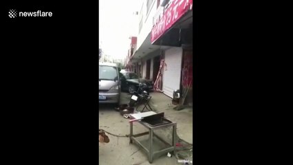 Goat appears to beg for mercy at butcher's stand